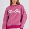 Jersey oversize de punto con logo en rosa magenta