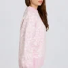Jersey oversize de punto jacquard en rosa