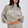 Jersey oversize de punto suave en color beige