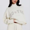 Jersey oversize de punto suave en color marfil