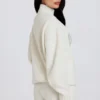 Jersey oversize de punto suave en color marfil