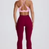 Leggings acampanados con cintura en V y bolsillos Soft Active en color burdeos