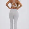 Leggings acampanados con cintura en V y bolsillos Soft Active en gris