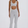 Leggings acampanados con cintura en V y bolsillos Soft Active en gris