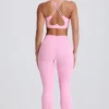 Leggings acampanados Soft Active con cintura en V y bolsillos en rosa bebé