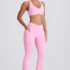 Leggings acampanados Soft Active con cintura en V y bolsillos en rosa bebé