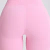 Leggings acampanados Soft Active con cintura en V y bolsillos en rosa bebé