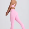 Leggings acampanados Soft Active con cintura en V y bolsillos en rosa bebé
