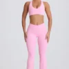 Leggings acampanados Soft Active con cintura en V y bolsillos en rosa bebé