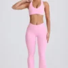 Leggings acampanados Soft Active con cintura en V y bolsillos en rosa bebé