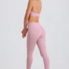 Leggings con estribos y cintura media con vuelta en malva