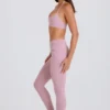 Leggings con estribos y cintura media con vuelta en malva