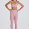 Leggings con estribos y cintura media con vuelta en malva