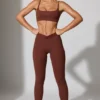 Leggings largos con bolsillos en marrón