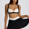 Mini falda-pantalón plisada Soft Active Crossover en negro