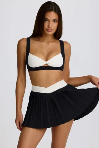 Mini falda-pantalón plisada Soft Active Crossover en negro