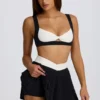 Mini falda-pantalón plisada Soft Active Crossover en negro