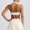 Minifalda-pantalón cruzada de jersey cepillado en marmolado marfil