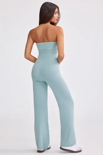 Mono bandeau de punto grueso con pernera acampanada en verde azulado apagado