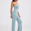 Mono bandeau de punto grueso con pernera acampanada en verde azulado apagado