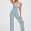 Mono bandeau de punto grueso con pernera acampanada en verde azulado apagado