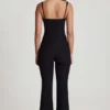 Mono Elanie con cuello redondo, corsé y pernera acampanada en negro