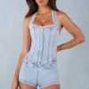 Mono Lalita con cuello halter y botones en denim claro