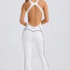 Mono Petite Soft Active con espalda abierta en blanco