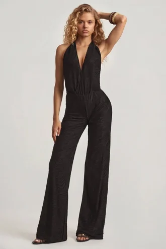 Mono Tulay de devoré con cuello halter y espalda abierta en negro