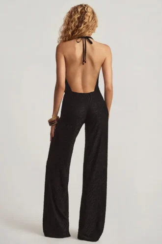 Mono Tulay de devoré con cuello halter y espalda abierta en negro