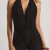 Mono Tulay de devoré con cuello halter y espalda abierta en negro