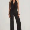 Mono Tulay de devoré con cuello halter y espalda abierta en negro