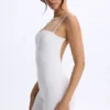 Mono Vera de modal con cuello corazón y espalda baja en blanco