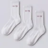 Pack de 3 calcetines de cuello medio acanalados en blanco y rosa