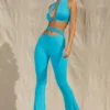 Pantalones acampanados con aberturas Valerie Petite en color aguamarina
