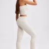 Pantalones acampanados con vuelta de punto grueso en color crema