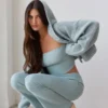 Pantalones acampanados con vuelta de punto grueso en verde azulado apagado