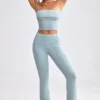 Pantalones acampanados con vuelta de punto grueso en verde azulado apagado