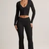 Pantalones acampanados con vuelta y canalé de Modal Jules en negro