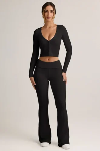 Pantalones acampanados con vuelta y canalé de Modal Jules en negro