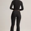 Pantalones acampanados con vuelta y canalé de Modal Jules en negro