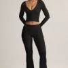 Pantalones acampanados con vuelta y canalé de Modal Jules en negro