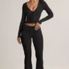 Pantalones acampanados con vuelta y canalé de Modal Jules en negro