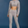 Pantalones acampanados con vuelta y punto trenzado en gris jaspeado
