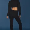 Pantalones acampanados con vuelta y punto trenzado en negro