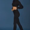Pantalones acampanados con vuelta y punto trenzado en negro