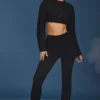 Pantalones acampanados con vuelta y punto trenzado en negro
