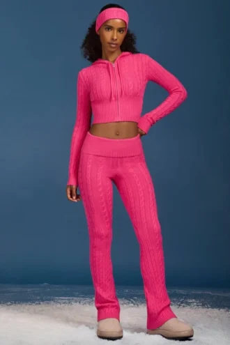 Pantalones acampanados con vuelta y punto trenzado en rosa intenso