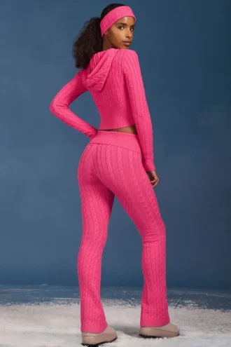 Pantalones acampanados con vuelta y punto trenzado en rosa intenso