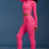 Pantalones acampanados con vuelta y punto trenzado en rosa intenso